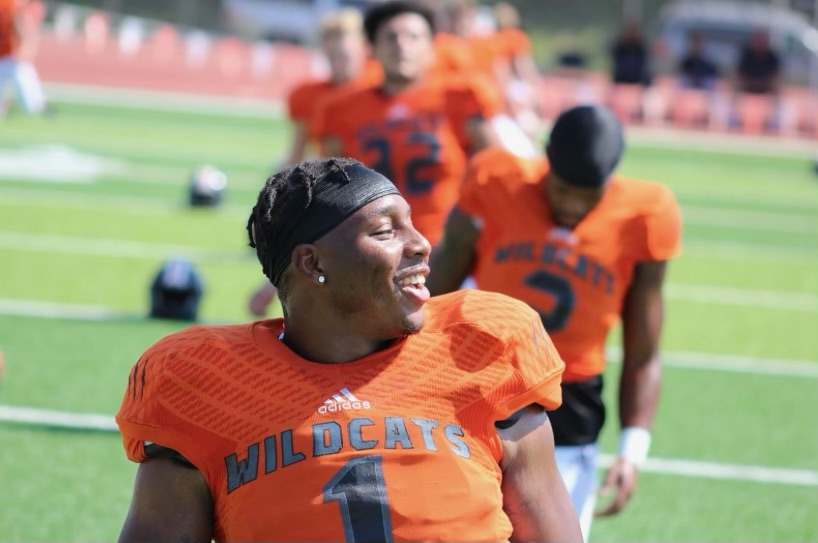 Former LHS standout JD Woods sets NAIA rushing record during Baker’s 41